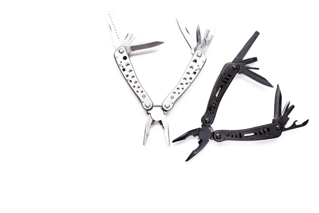 Folding multi-tool knife with blades open, shown against a white background