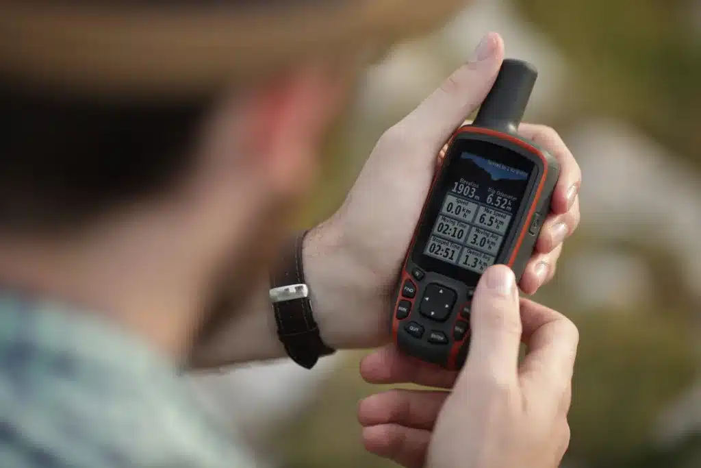 the-man-is-holding-his-gps-device-in-his-hand-2025-03-08-04-19-49-utc