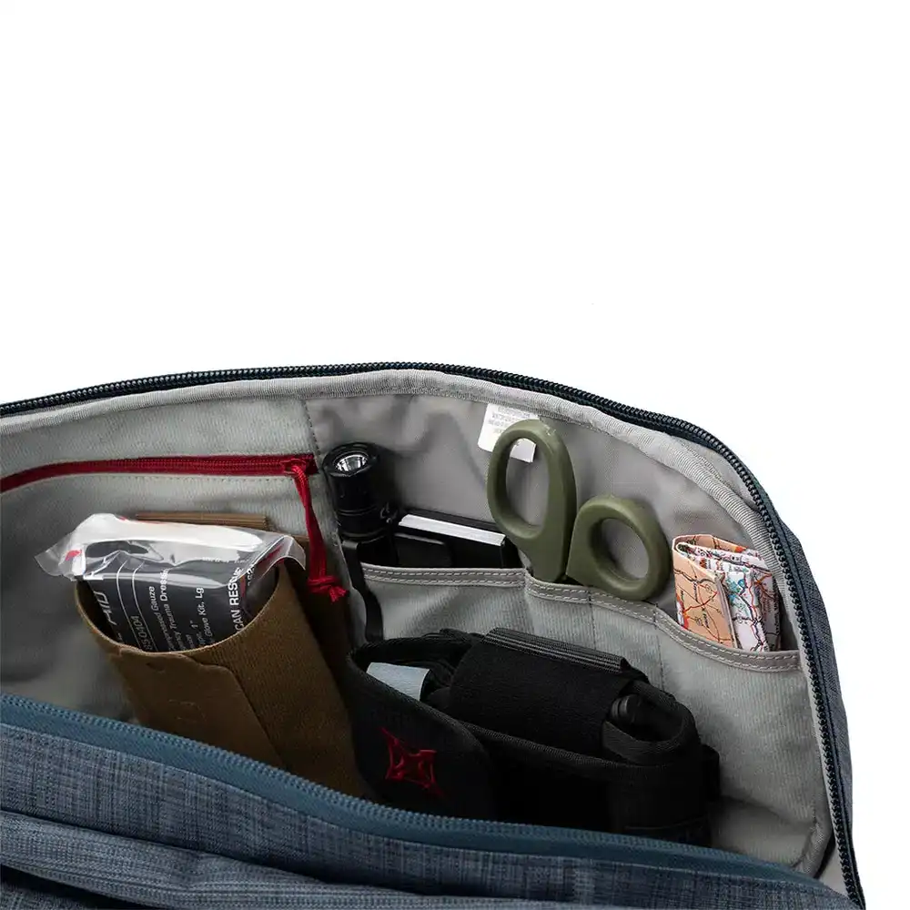 Compact travel backpack with organized interior storage for outdoor gear and essentials. Perfect for hiking, camping, and adventure travel. Well-designed for easy access and convenience.