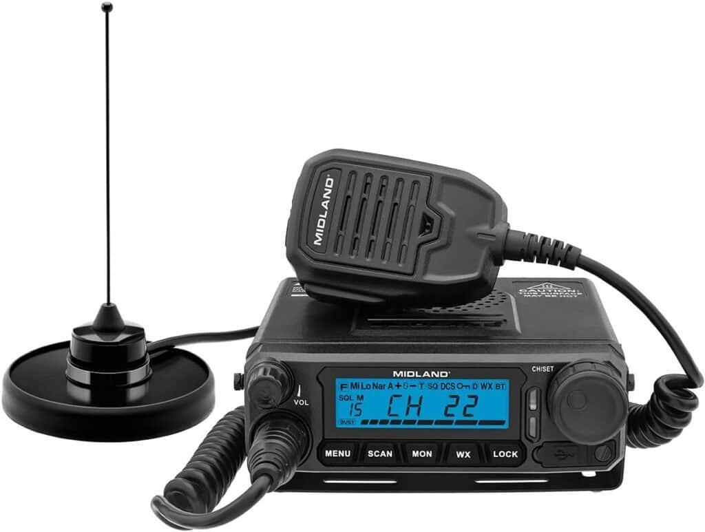 Midland CB radio with microphone, digital display, and antenna for truck, motorcycle, or off-road communication, essential for safe and effective long-distance vehicle communication.