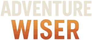 Adventure Wiser logo featuring bold text with a gradient color scheme, representing outdoor adventure and travel expertise.